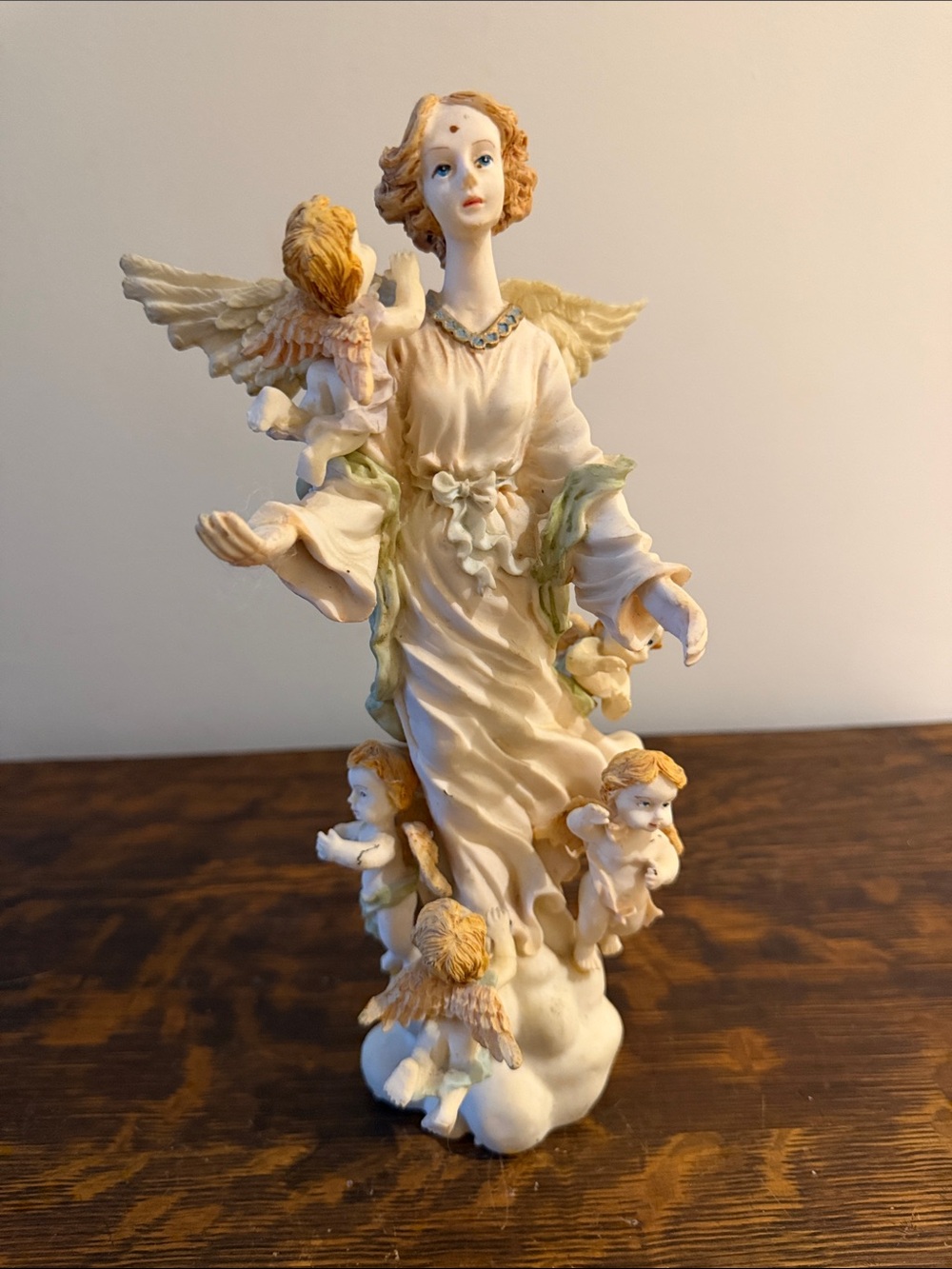 Resin Angel with surronged cherubs